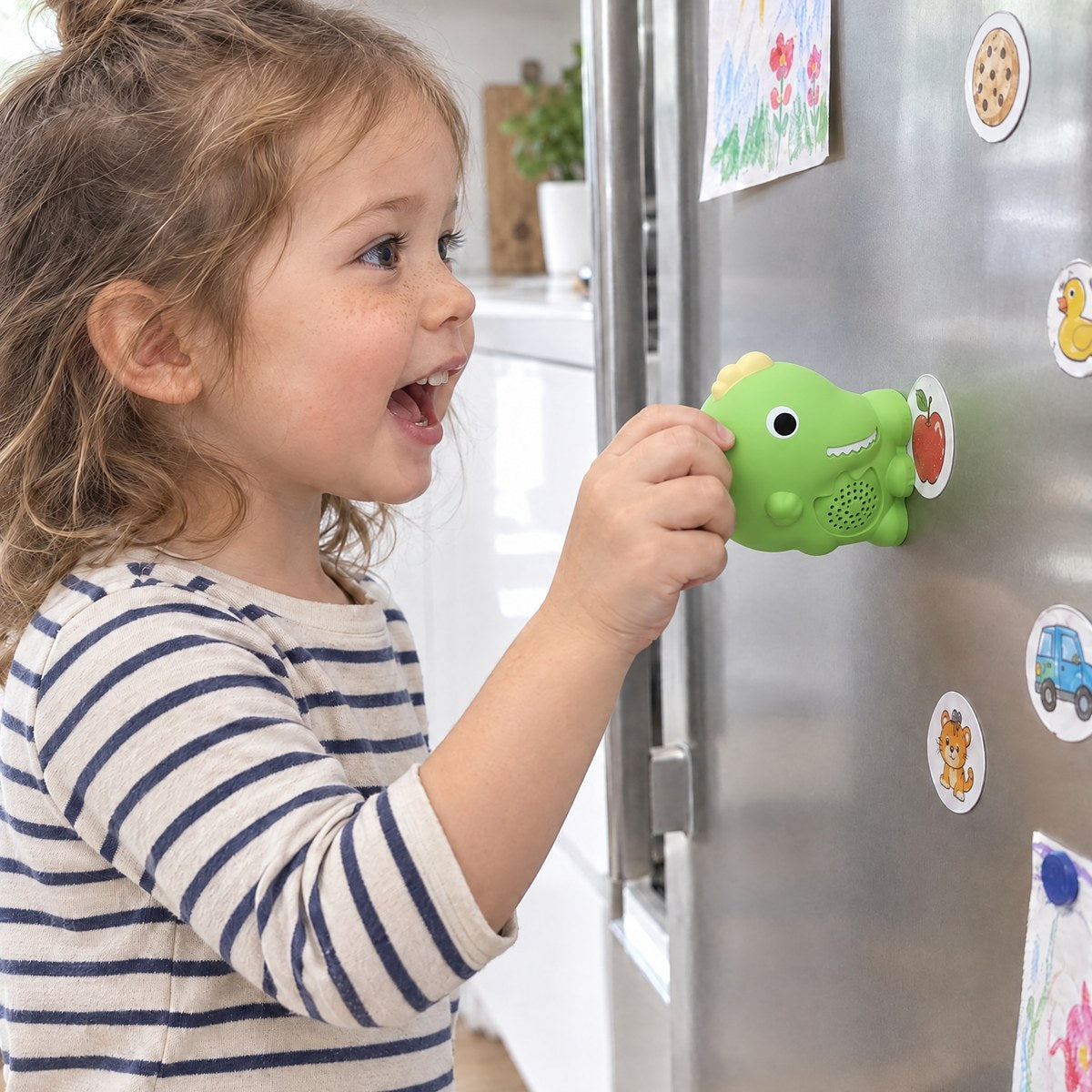 A toddler taps Echo on a talking sticker on the fridge